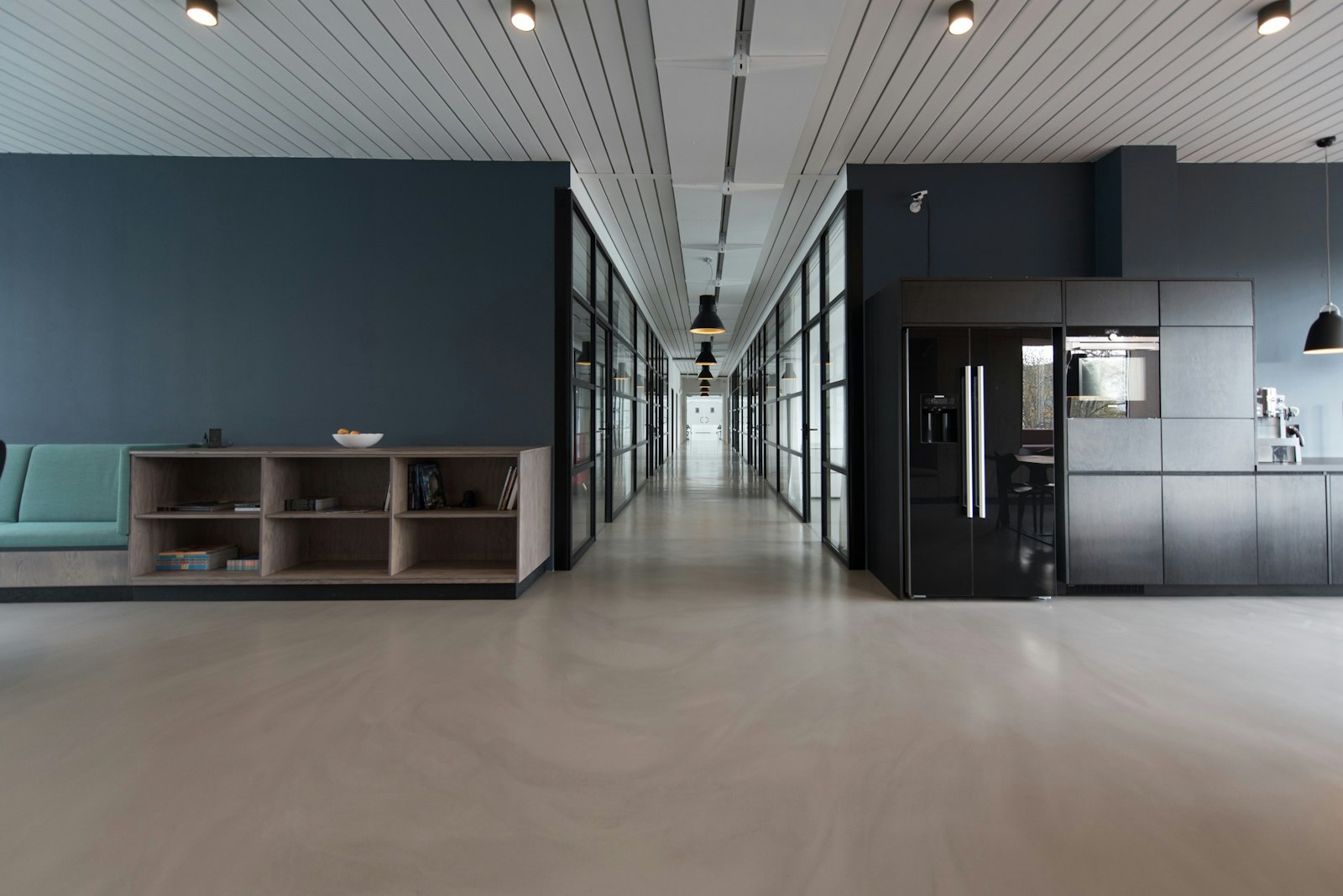 Modern office space with seamless polished flooring